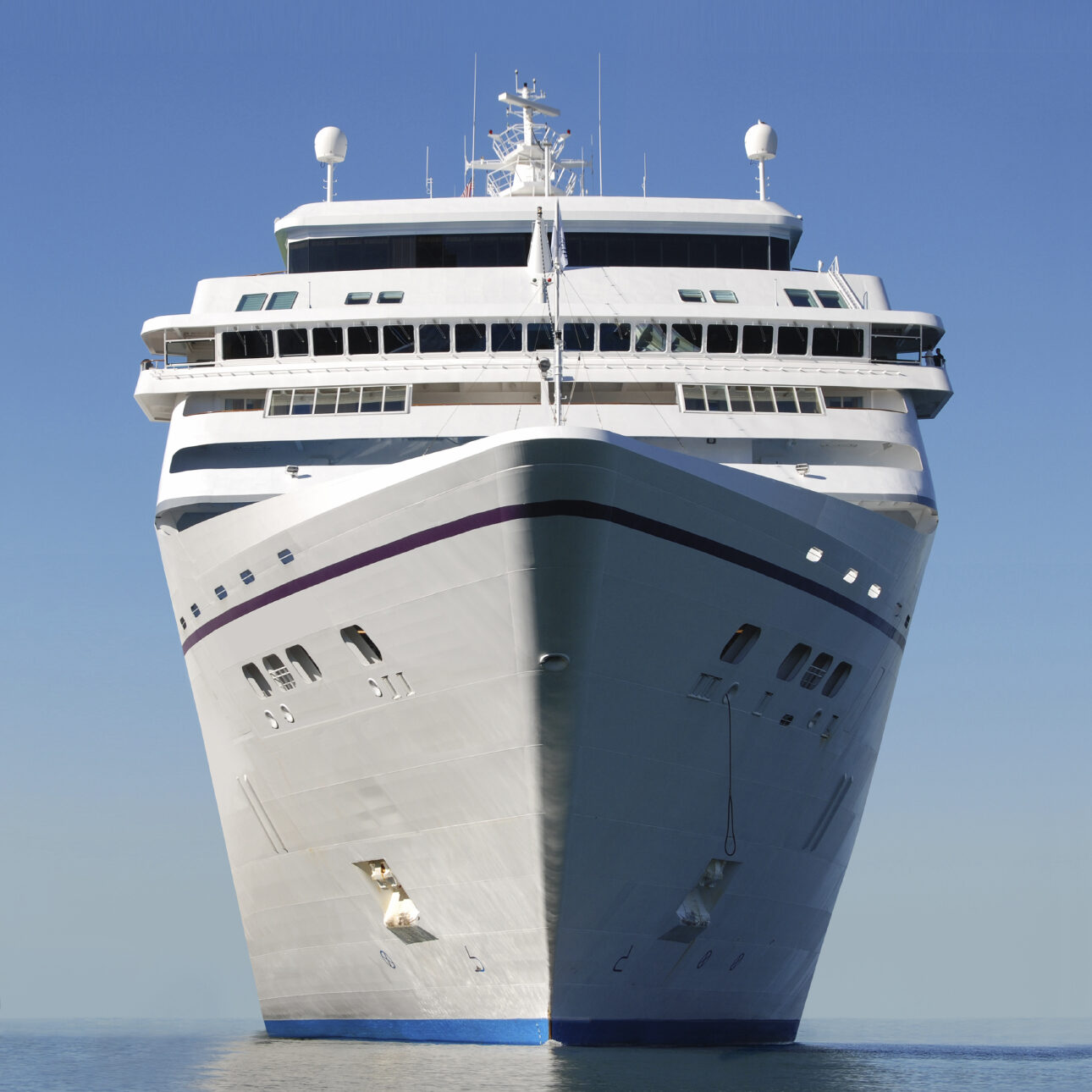 water level view of cruise ship facing the bow